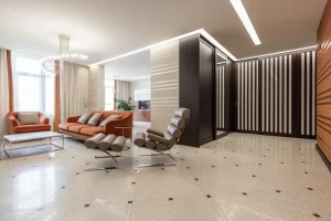 Brand new luxury apartment floors featuring secure covered stilt parking in Defence Colony, Delhi.